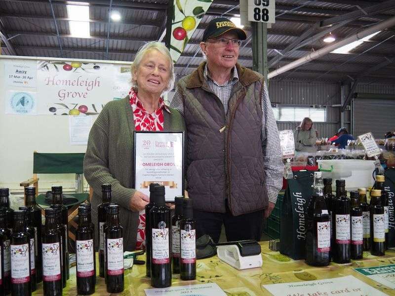 20 Years of Homeleigh Grove at the CRFM Peter and Caroline at the market